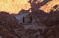 Picturesque view of Mount Sinai Mount Horeb, Gabal Musa during sunrise. Small bedouin`s dwelling in the valley